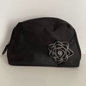 Lancome black makeup bag with edgy flower